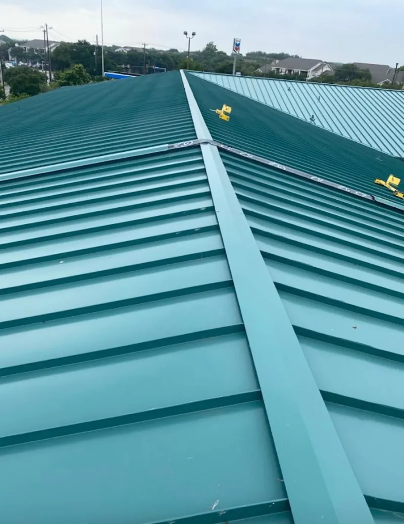 Green commercial metal roof ridge and valley for Metal Roof Repair in Crestview